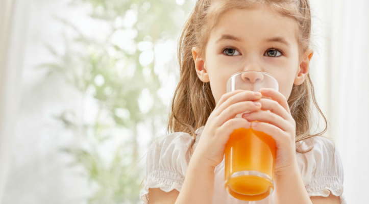 kid drinking juice
