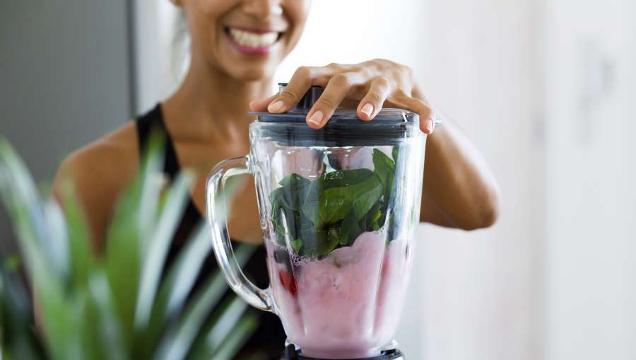 woman making juice