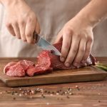 cutting raw meat