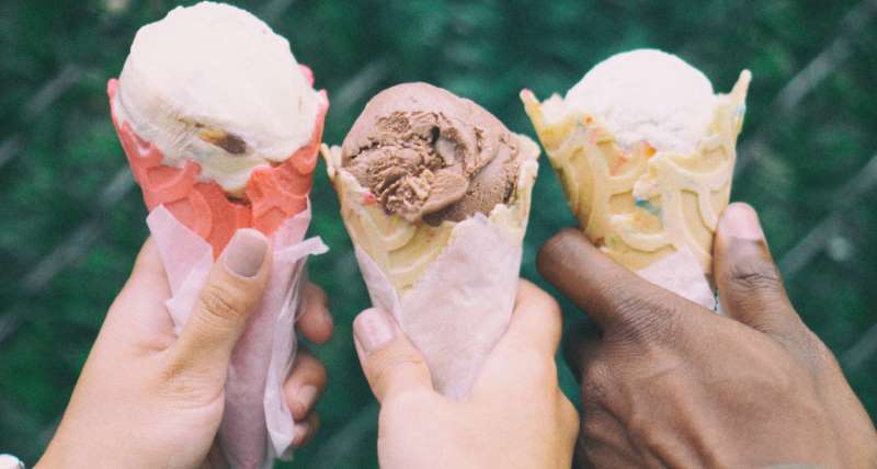 people holding ice cream