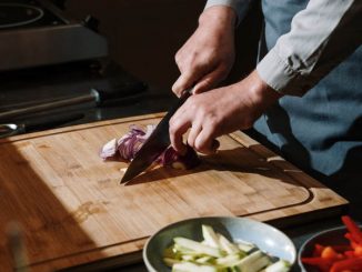 slicing vegetables with a kitchen knife