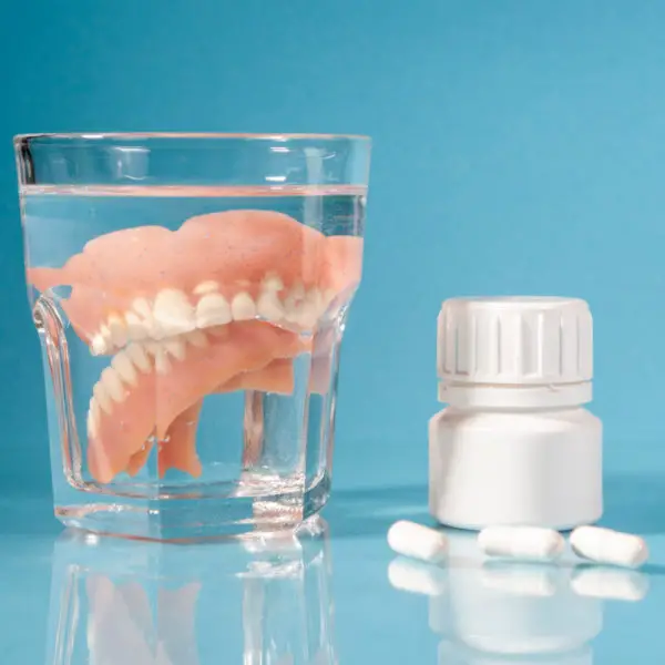 cleaning teeth with denture tablets