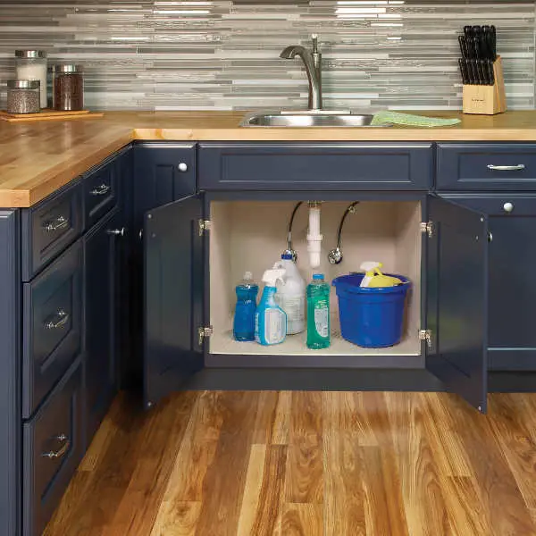 crammed under sink cabinet