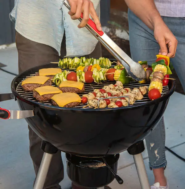 cooking on charcoal BBQ grill