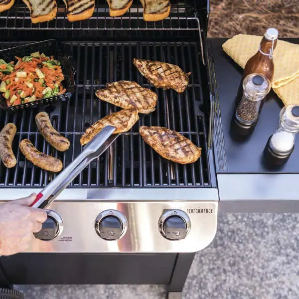 flipping food on gas grill