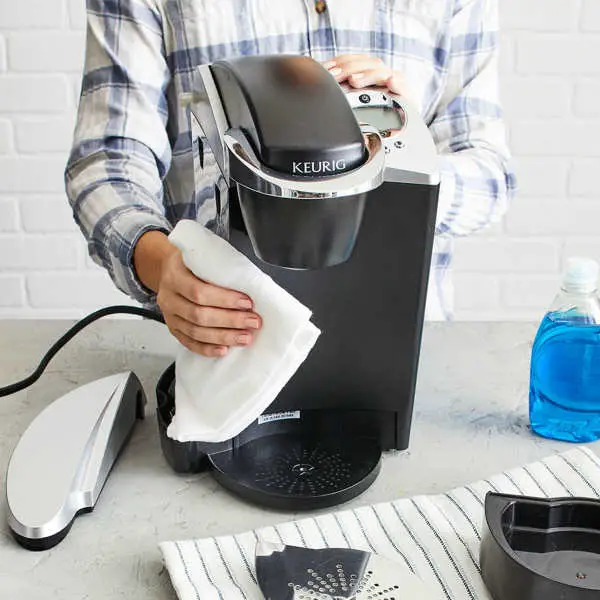 wiping coffee maker