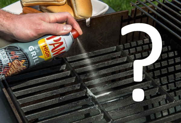 spraying PAM on grill grates