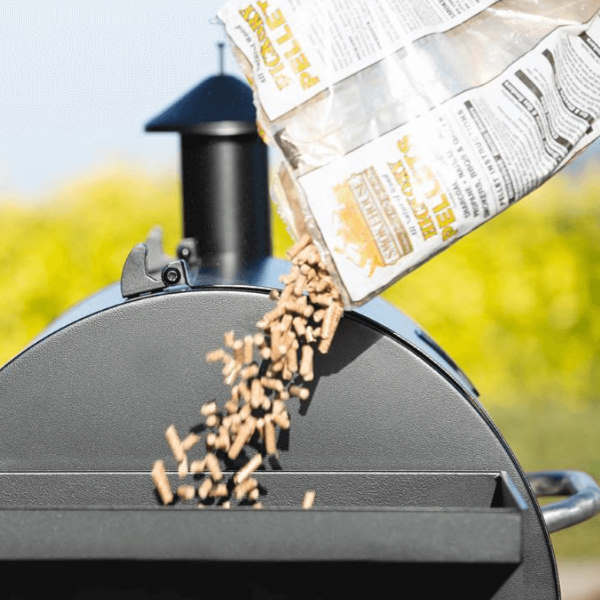 loading pellet grill with pellets