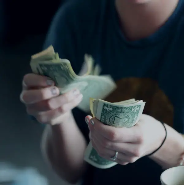 woman counting money