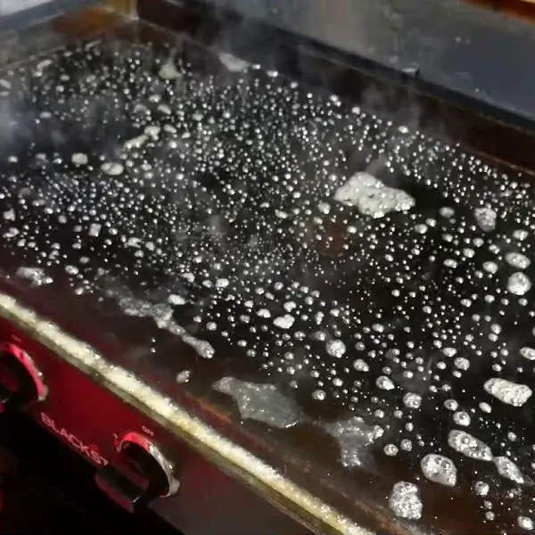 cleaning blackstone griddle with water