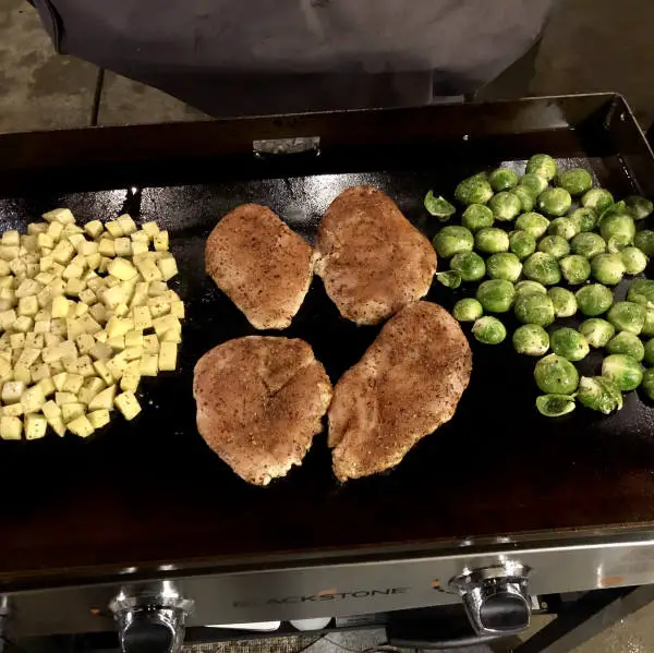 cooking dinner on blackstone flat top grill