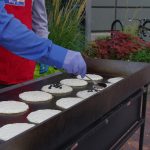 making pancakes on flat top grill