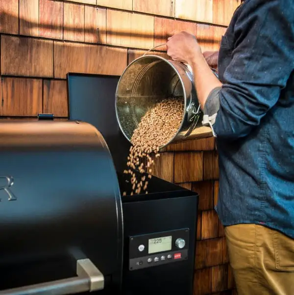 adding pellets to traeger pellet grill